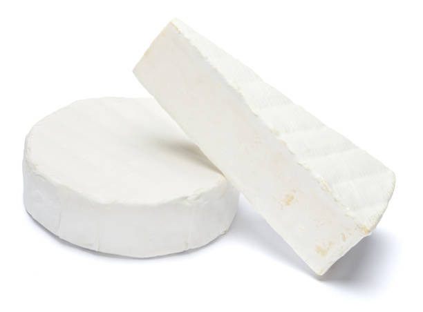 istock Round brie or camambert cheese on a white background 908619016