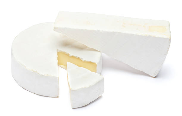 istock Round brie or camambert cheese on a white background 908621396