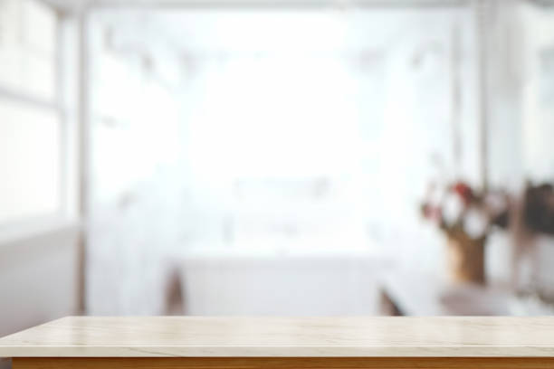 istock Empty pink marble top table with blurred bathroom interior Background. for product display montage. 908625242