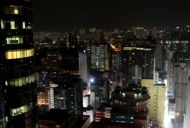 istock Hong Kong skyscrapers at night 908630018