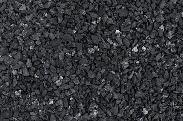 Dark pattern of gravel stone wall texture