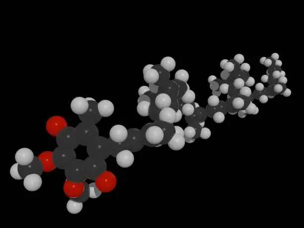 Photo of 3D illustration of molecule of coenzyme q10 (CoQ10), popular nutritional and antiaging supplement. It is important compound in mitochondrial respiratory chain, antioxidant that quenches free radicals generated in mitochondria. Isolated on black.