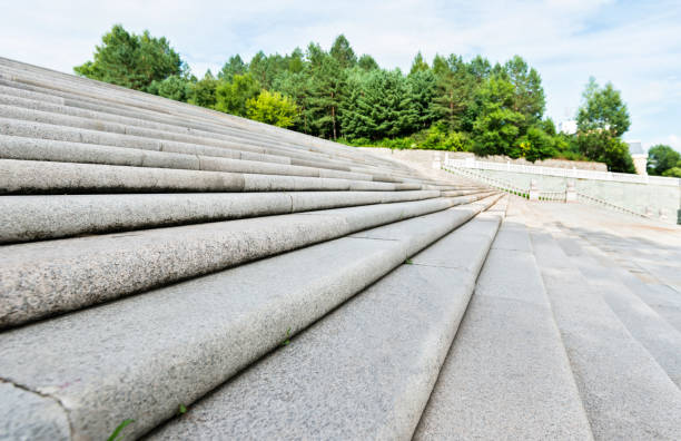 istock Row of stone stairs in the park 908640028