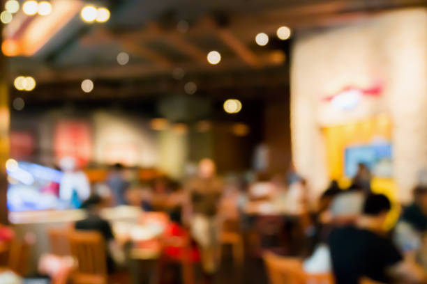 istock Abstract cafe coffee shoop restaurant blur background with bokeh light 908643578