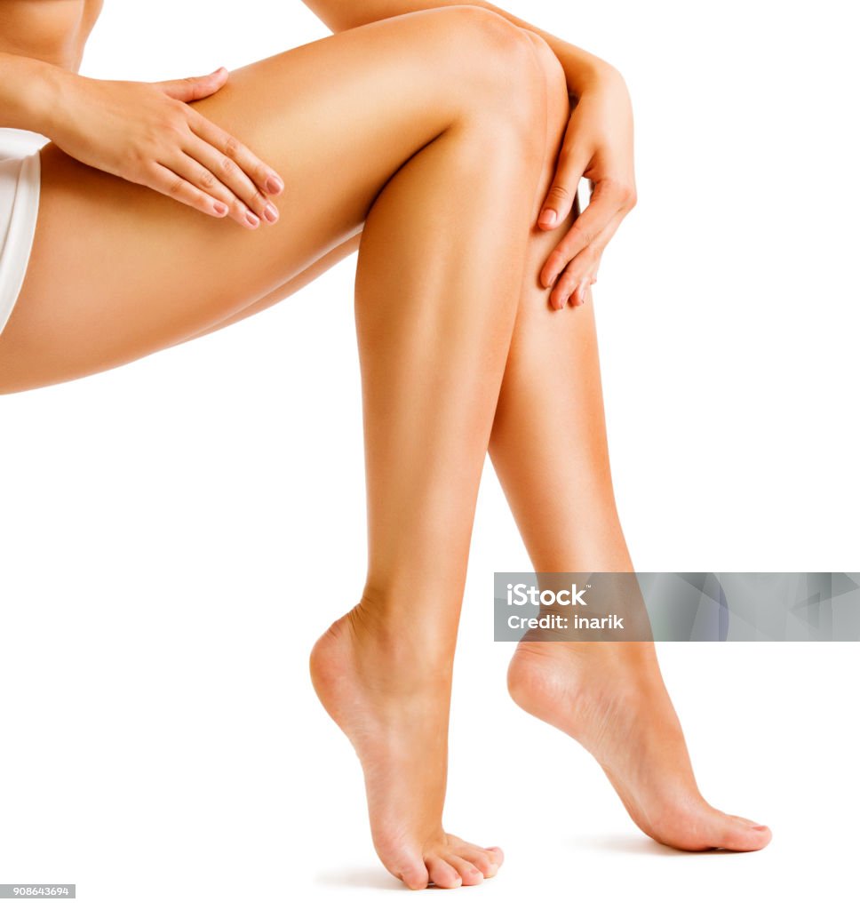 Legs Smooth Skin, Woman Touching Hairless Leg, Female Beauty Care and Hair Removal Legs Smooth Skin, Woman Touching Hairless Leg, Female Beauty Care and Hair Removal, Sexy Body Isolated on White Background Leg Stock Photo