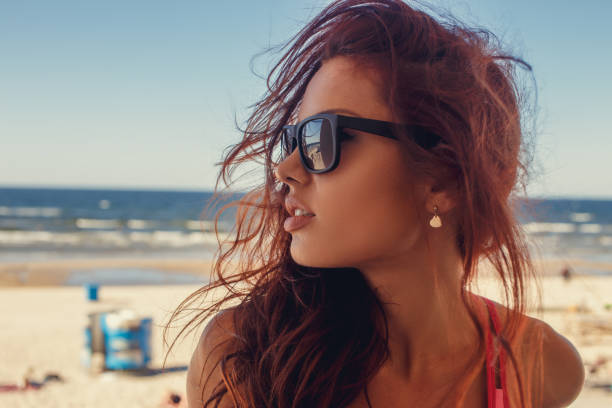 istock A  woman in a sunglasses. 908643816