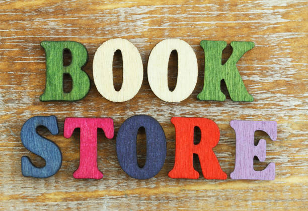 istock Bookstore written with wooden letters on rustic wooden surface 908643910