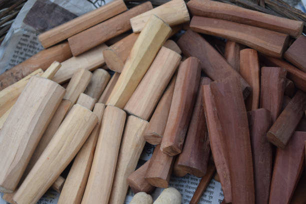 Sandalwood sticks Sandalwood sticks placed on old news paper sandalwood stock pictures, royalty-free photos & images