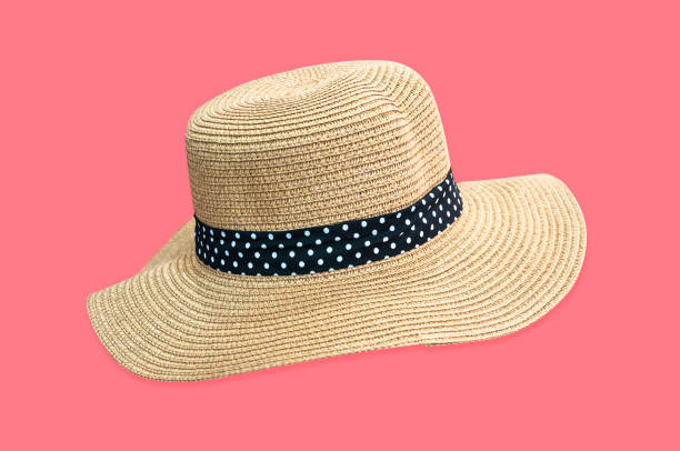 Woven fedora hat isolated on pink background