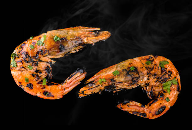 istock Barbeque grilled prawns with spicy ingredients. 908651752