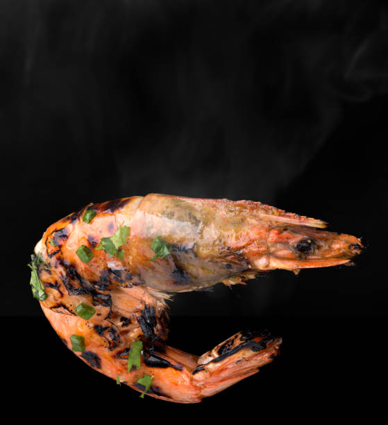 istock Barbeque grilled prawns with spicy ingredients. 908653992
