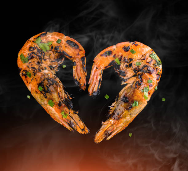 istock Barbeque grilled prawns with spicy ingredients. 908654542