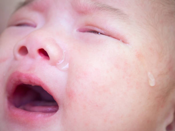 istock newborn baby girl crying 908664618