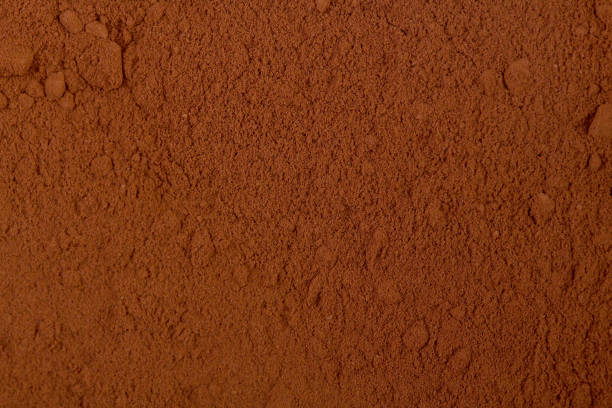 Background of a dry powder cocoa Background of a dry powder cocoa. Hi res photo. cocoa powder stock pictures, royalty-free photos & images