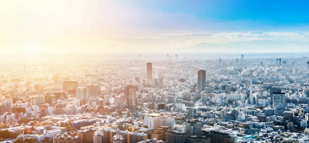 vue aérienne oeil oiseau de shinjuku avec la lumière du soleil flare - roppongi hills photos et images de collection