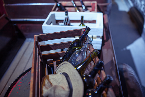 botellas vacías de vino en un carro de contrabandistas photo