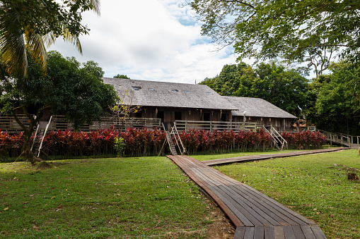 Iban longhouse. Traditional wooden houses in the Kuching to Sarawak Culture village. Borneo, Malaysia