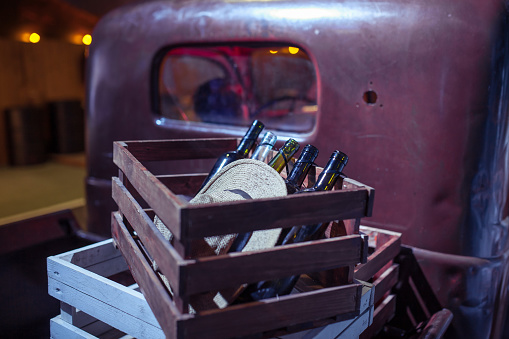 botellas vacías de vino en un carro de contrabandistas photo