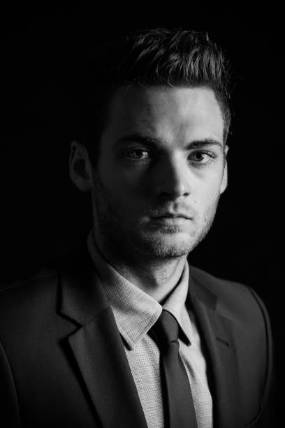 istock Portrait of a smart man 908676694