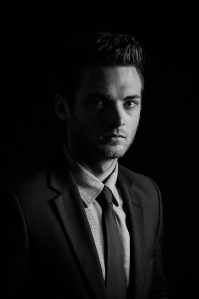 istock Portrait of a smart man 908678240