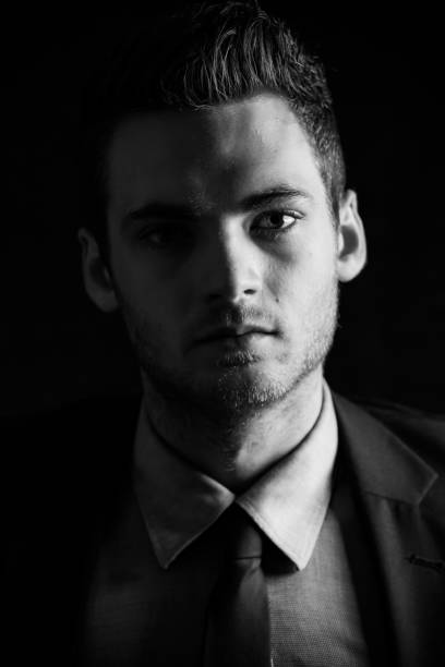 istock Portrait of a smart man 908678312