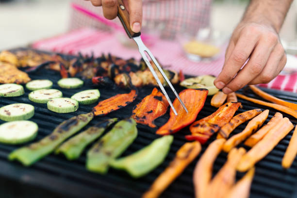 Grilling Vegetables and meat on the grill, close up grilled stock pictures, royalty-free photos & images