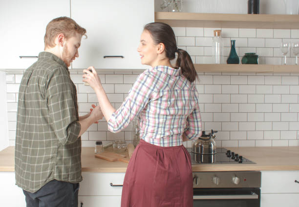 istock couple cooking at home kitchen together 908682140