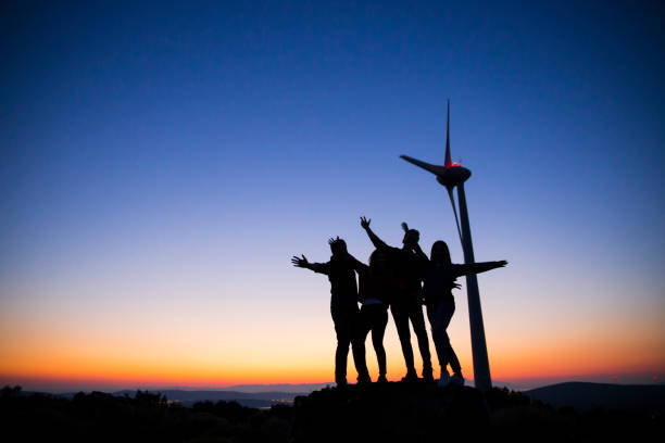 istock Young friends enjoying nature at sunset 908682672