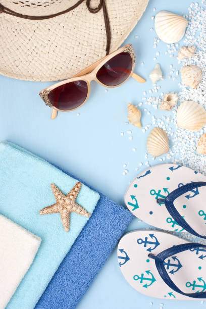 istock Beach items with  sunglasses  on wooden background 908685936