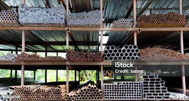 Different Sizes Of Steel Tubes On The Shelf Stock Photo - Download Image Now - Pipe - Tube, Steel, Merchandise