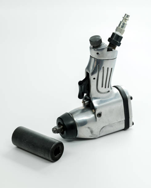 istock Shop tool air wrench with a socket for removing tires 908689466