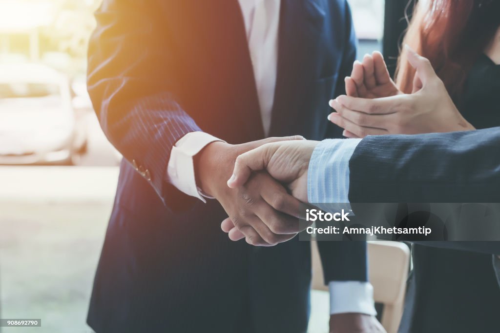 Business shaking hands. Business executives to congratulate the joint. Business Stock Photo