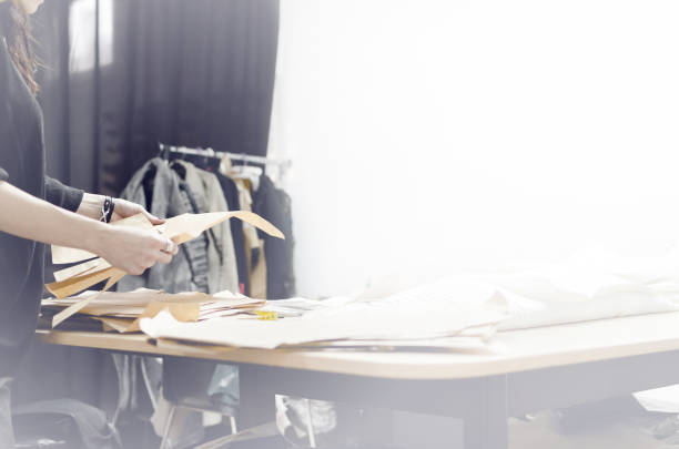 istock Woman's hands are looking paper 908693248