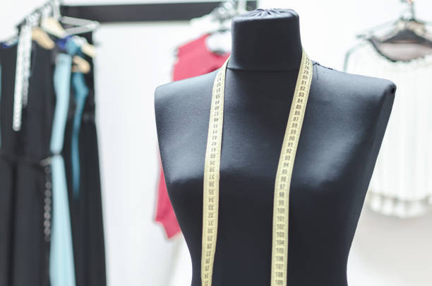 istock doll in the clothing store 908693294