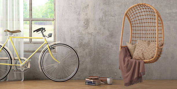 istock Modern hipster interior with pendant chair window and curtains with copy space wall 908700394