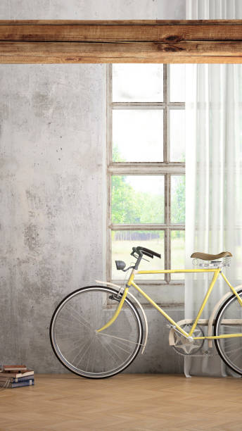 istock interior with yellow bicycle and blank concrete wall with window and a curtain 908700410