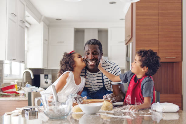 istock Father cooking with kids 908713906