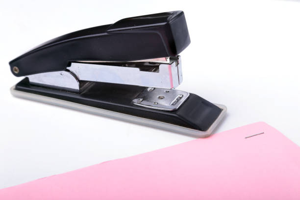 istock The stapler is used in the office to manually connect paper. 908715140
