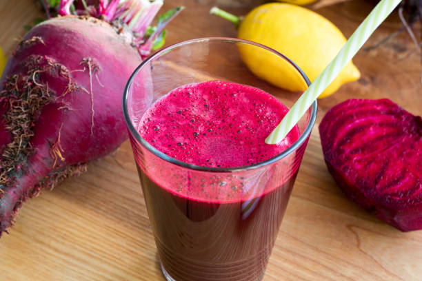 istock Red beet juice in a glass 908723662