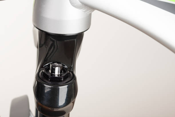 istock Air valve of suspension bicycle fork, close up view 908729748