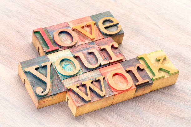love your work - word abstract in wood type love your work  - word abstract in letterpress wood type printing blocks printing block photos stock pictures, royalty-free photos & images