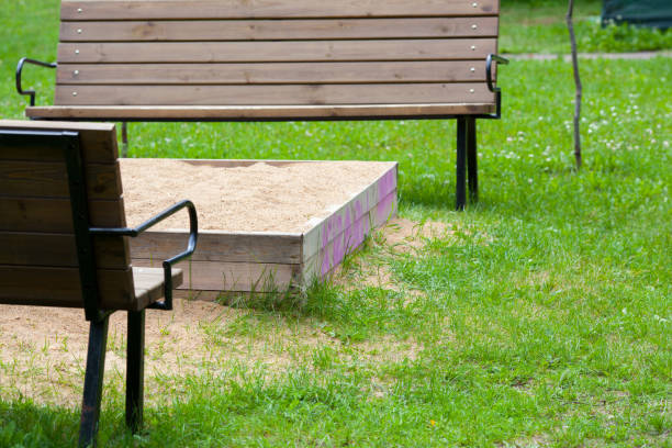 istock bench near the sandbox on the children's playground 908734170
