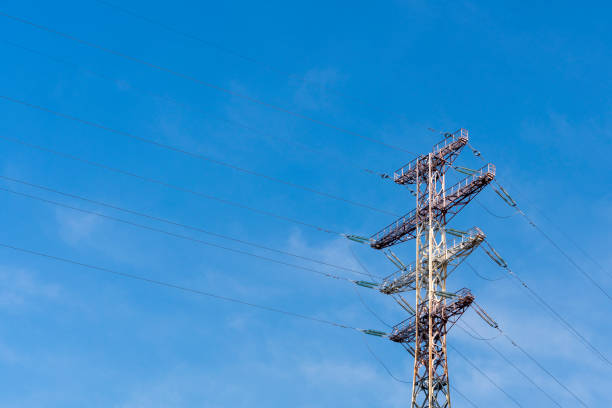 istock high voltage post. High-voltage tower 10,000 volts sky background. 908737744