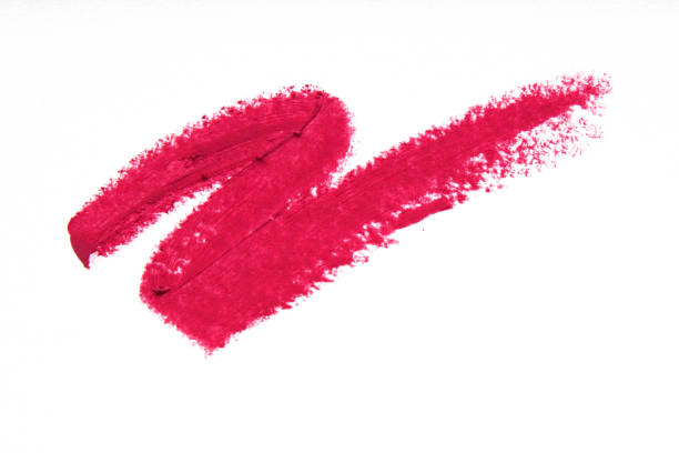abstriche von rosa lippenstift nahaufnahme isoliert auf weißem hintergrund. make-up, schönheit. - roter lippenstift stock-fotos und bilder