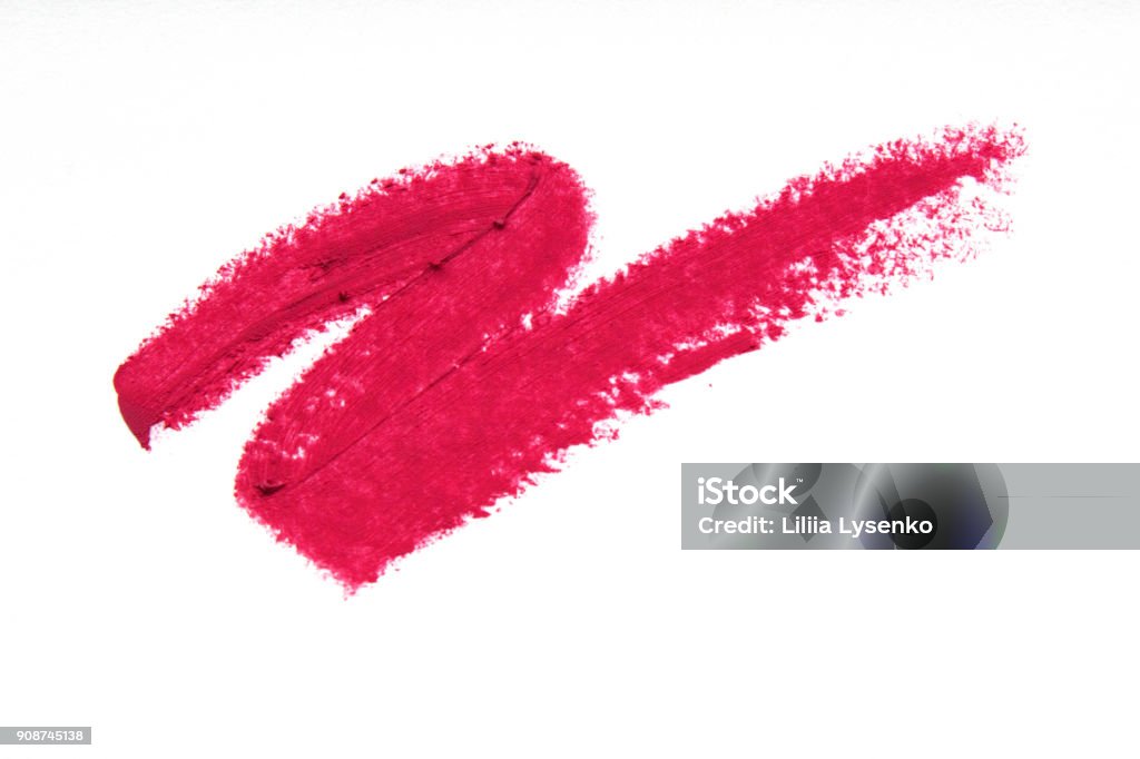 Smears of pink lipstick close-up isolated on white background. Make-up, beauty. Lipstick Stock Photo