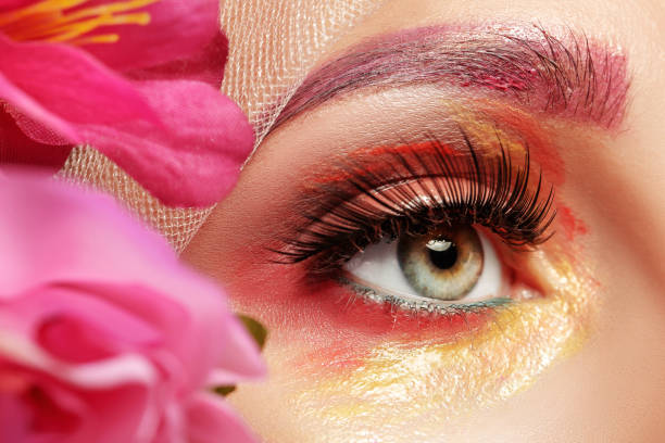 istock woman with flower make up 908745468