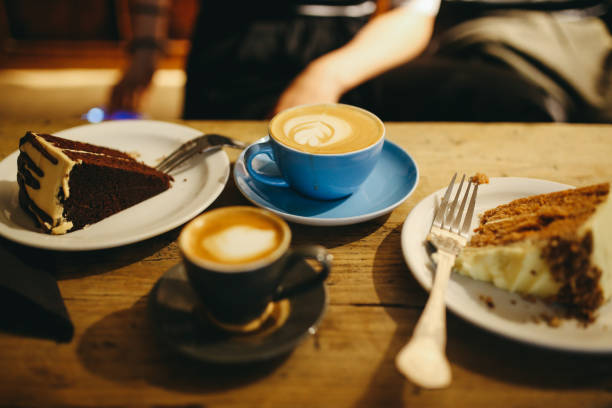 Coffee and cake on the table in a cafe in East London