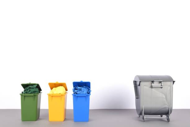 istock Colorful recycle bins on white background. 908748316