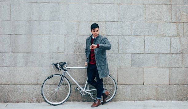 istock Bicyclist waiting for a friend 908750130