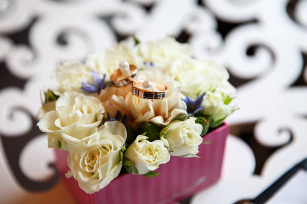 istock Wedding rings for bride and groom at wedding ceremony 908753318